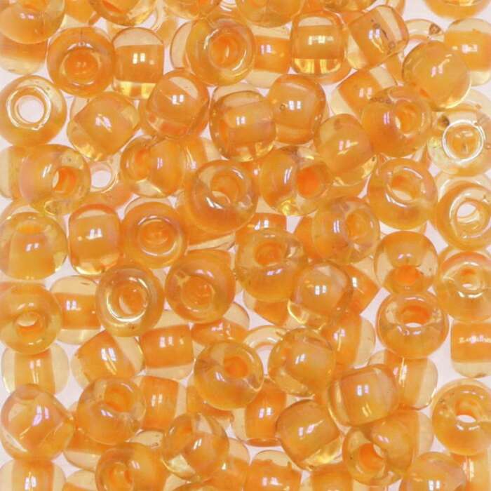 Toho Saatperlen 6/0 transparent Gelb mit orangem Einzug