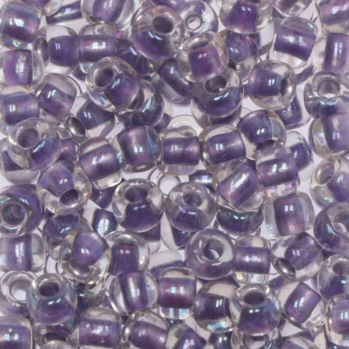 Toho Saatperlen 6/0 Kristal iris mit Farbeinzug Purpur metallic